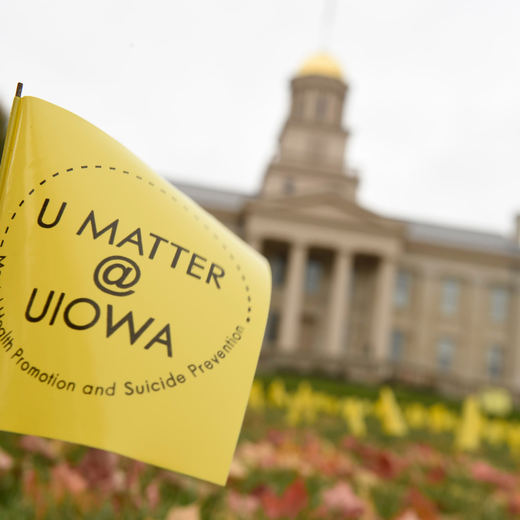 U Matter@Iowa flag with Old Capitol in the background.