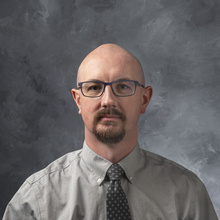 A headshot of Dr. David Miles