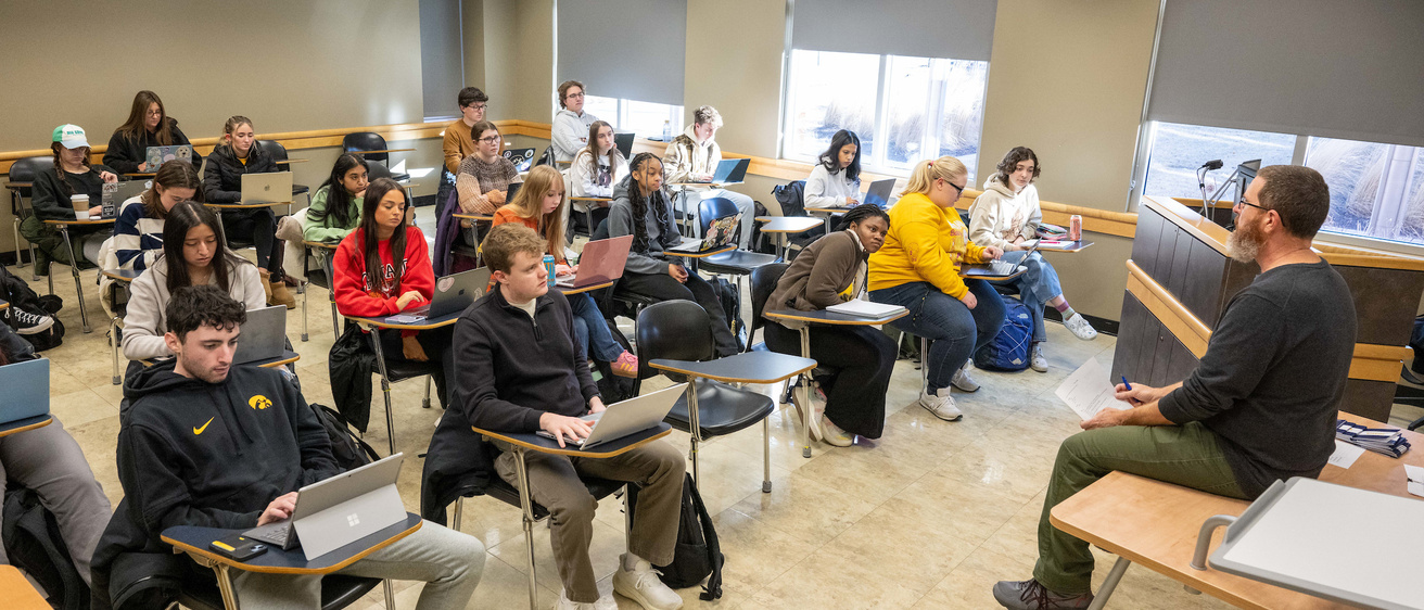 Teacher speaking to his class