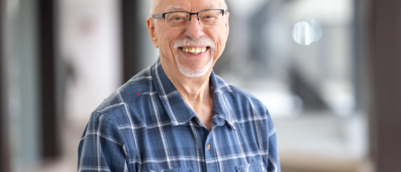 Gary Buettner smiles for a photo.
