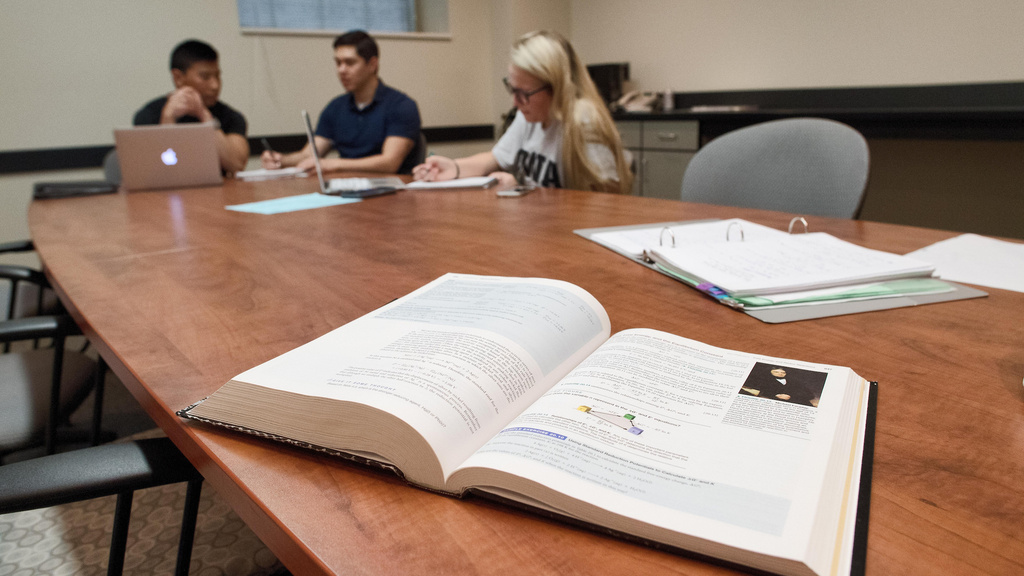 Textbook open in a chemistry class